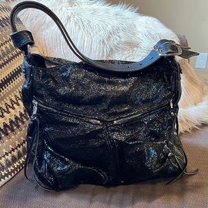Black patent Tylie Malibu hand bag just gorgeous in amazing condition